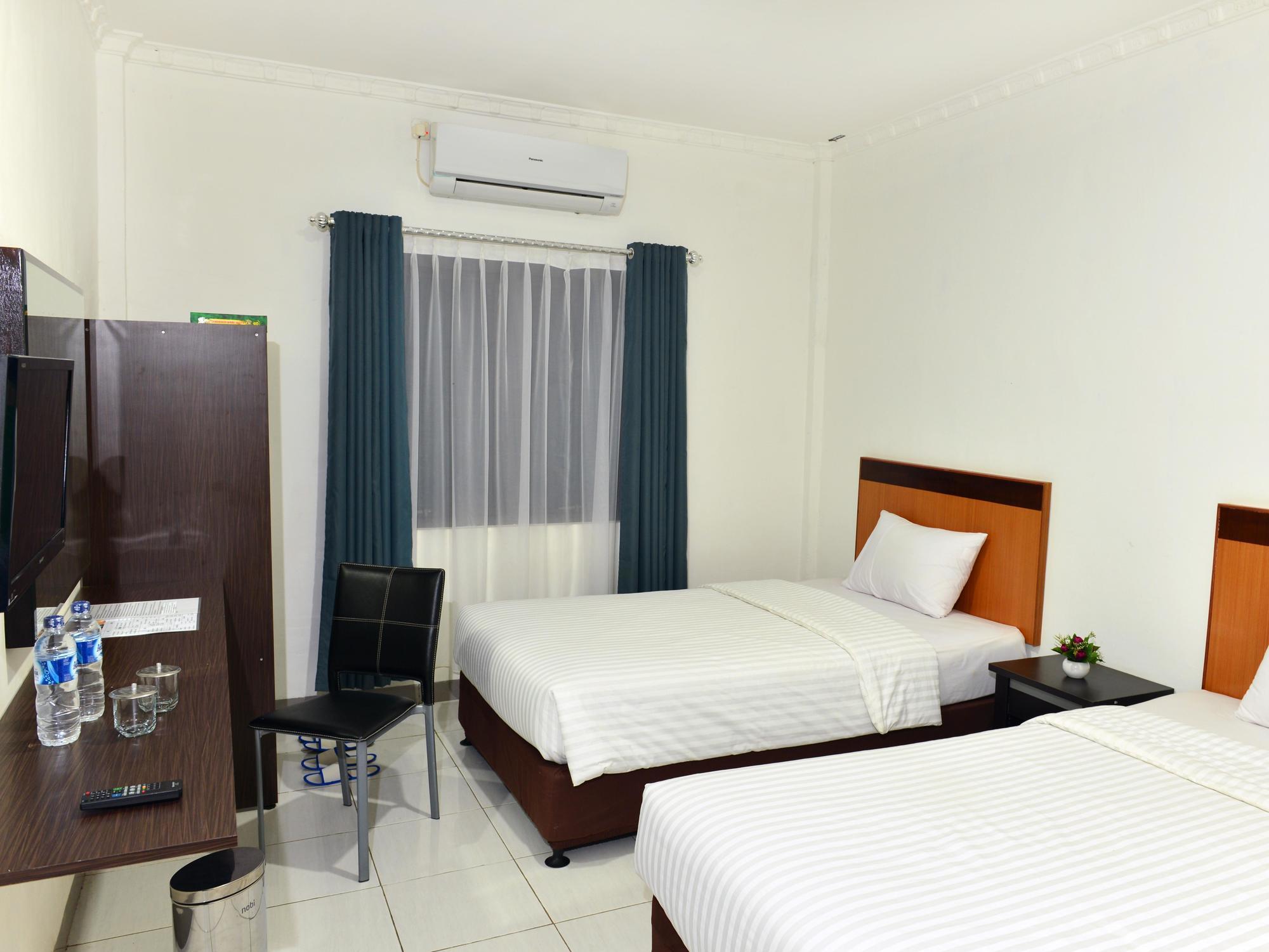 Oyo 480 Hotel Demuon Belitung Bagian luar foto